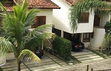 Imagem: A casa possui 3 Dormitórios, 5 Banheiros, 4 Vagas na garagem