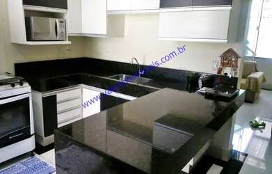 Imagem: A casa possui 3 Dormitórios, 3 Banheiros, 2 Vagas na garagem