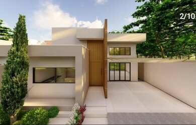 Imagem: A casa possui 3 Dormitórios, 1 Banheiro, 2 Vagas na garagem