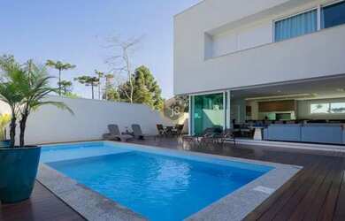 Imagem: A casa em condomínio possui 4 Dormitórios, 5 Banheiros, 5