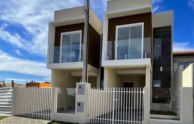 Imagem: A casa possui 3 Dormitórios, 2 Banheiros, 1 Vaga na garagem