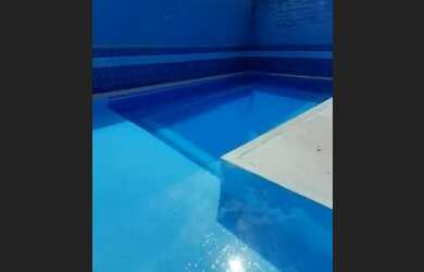 Imagem: A casa possui 5 Dormitórios, 3 Banheiros, 2 Vagas na garagem