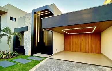 Imagem: A casa possui 4 Dormitórios, 4 Banheiros, 3 Vagas na garagem