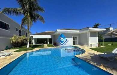 Imagem: A casa em condomínio possui 5 Dormitórios, 5 Banheiros, 5