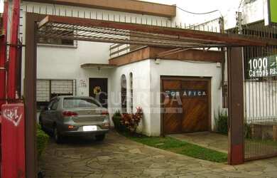 Imagem: A casa possui 3 Dormitórios, 3 Banheiros, 3 Vagas na garagem