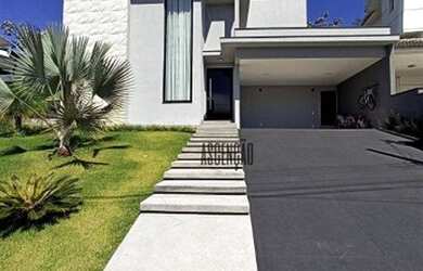 Imagem: A casa em condomínio possui 4 Dormitórios, 5 Banheiros, 4