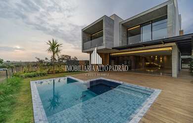 Imagem: A casa em condomínio possui 4 Dormitórios, 5 Banheiros, 4