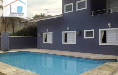 Imagem: A casa em condomínio possui 5 Dormitórios, 5 Banheiros, 4