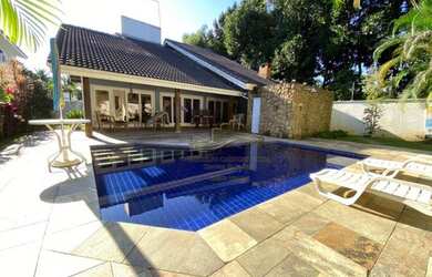 Imagem: A casa em condomínio possui 5 Dormitórios, 5 Banheiros, 5