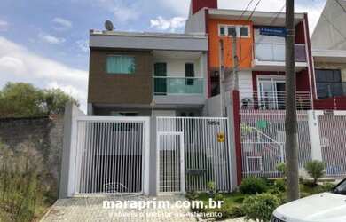 Imagem: A casa possui 3 Dormitórios, 1 Banheiro, 2 Vagas na garagem