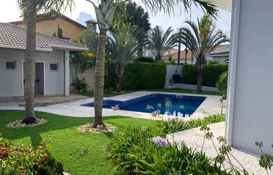 Imagem: A casa em condomínio possui 4 Dormitórios, 2 Banheiros, 2