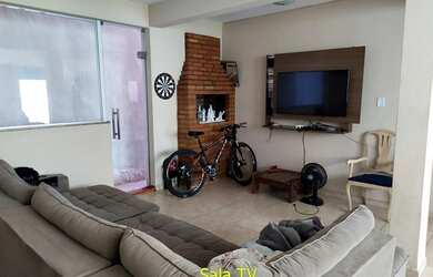 Imagem: A casa possui 4 Dormitórios, 4 Banheiros, 3 Vagas na garagem