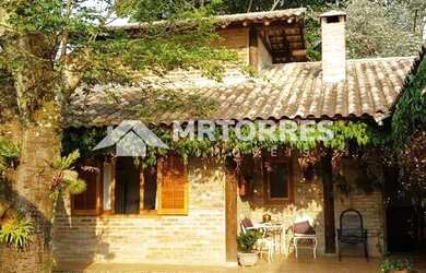 Imagem: A casa em condomínio possui 3 Dormitórios, 4 Banheiros, 2