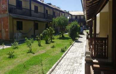 Imagem: A casa possui 3 Dormitórios, 2 Banheiros, 1 Vaga na garagem