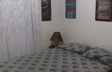 Imagem: A casa possui 3 Dormitórios, 2 Banheiros, 4 Vagas na garagem