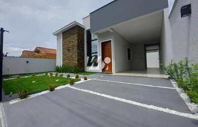 Imagem: A casa possui 3 Dormitórios, 2 Banheiros, 2 Vagas na garagem