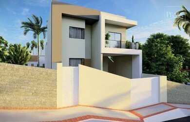 Imagem: A casa possui 3 Dormitórios, 5 Banheiros, 2 Vagas na garagem