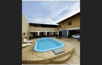 Imagem: A casa possui 2 Dormitórios, 2 Banheiros, 4 Vagas na garagem