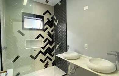 Imagem: A casa possui 3 Dormitórios, 4 Banheiros, 4 Vagas na garagem