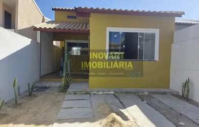 Imagem: A casa possui 3 Dormitórios, 2 Banheiros, 1 Vaga na garagem