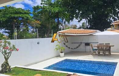 Imagem: A casa em condomínio e possui 4 Dormitórios, Suítes, 5 Banheiros