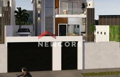 Imagem: A casa possui 4 Dormitórios, 2 Banheiros, 2 Vagas na garagem