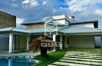 Imagem: A casa possui 3 Dormitórios, 2 Banheiros, 3 Vagas na garagem