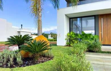 Imagem 3: Casa de condominio com concreto aparente