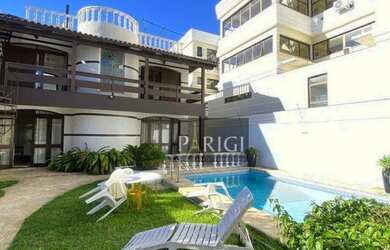 Imagem: A casa possui 5 Dormitórios, 3 Banheiros, 4 Vagas na garagem