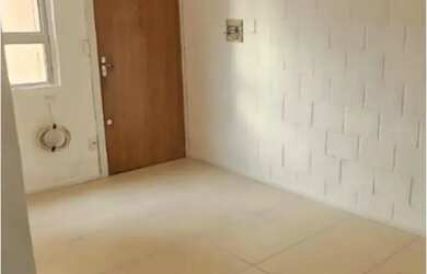 Imagem: O apartamento possui 2 Dormitórios, 1 Banheiro e 2 Vagas na