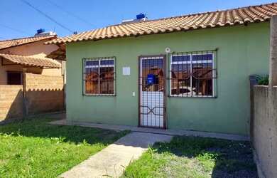 Imagem: A casa possui 2 Dormitórios, 1 Banheiro, 1 Vaga na garagem