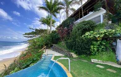 Imagem: A casa possui 4 Dormitórios, 5 Banheiros, 5 Vagas na garagem