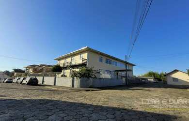 Imagem: O apartamento possui 3 Dormitórios, 1 Banheiro, 3 Vagas na