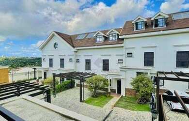 Imagem: A casa possui 4 Dormitórios, 5 Banheiros, 2 Vagas na garagem