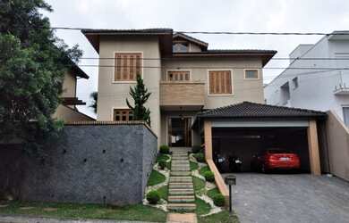 Imagem: A casa em condomínio possui 4 Dormitórios, 4 Banheiros, 4