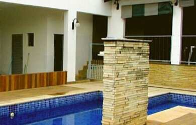 Imagem: A casa em condomínio possui 4 Dormitórios, 5 Banheiros, 4