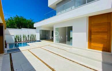 Imagem: A casa em condomínio possui 5 Dormitórios, 5 Banheiros, 2