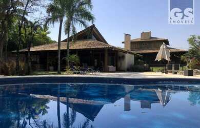 Imagem: A casa em condomínio possui 5 Dormitórios, 5 Banheiros, 4