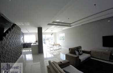 Imagem: A casa possui 3 Dormitórios, 3 Banheiros, 3 Vagas na garagem