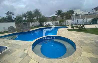 Imagem: A casa em condomínio possui 5 Dormitórios, 5 Banheiros, 4