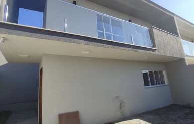 Imagem: A casa possui 3 Dormitórios, 3 Banheiros, 2 Vagas na garagem