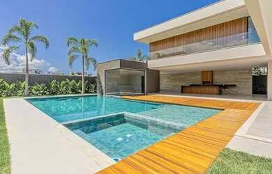 Imagem: A casa em condomínio possui 5 Dormitórios, 5 Banheiros, 2