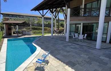 Imagem: A casa possui 5 Dormitórios, Acomodam 20 pessoas, 5 Vagas na