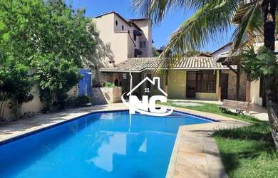 Imagem: A casa possui 4 Dormitórios, 2 Banheiros, 4 Vagas na garagem