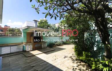 Imagem: A casa possui 4 Dormitórios, 4 Banheiros, 4 Vagas na garagem