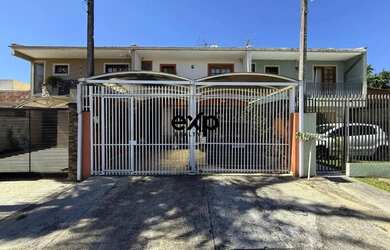 Imagem: A casa possui 3 Dormitórios, 3 Banheiros, 2 Vagas na garagem