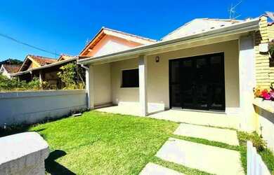 Imagem: A casa possui 3 Dormitórios, 4 Banheiros, 2 Vagas na garagem