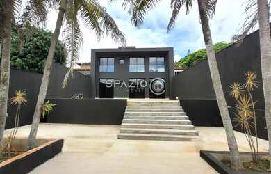 Imagem: A casa possui 3 Dormitórios, 5 Banheiros, 5 Vagas na garagem