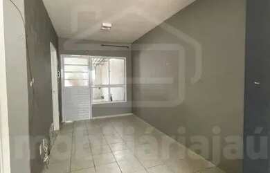 Imagem: A casa possui 2 Dormitórios, 1 Banheiro, 2 Vagas na garagem