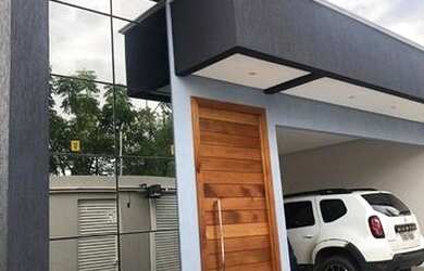 Imagem: A casa possui 3 Dormitórios, 2 Banheiros, 2 Vagas na garagem